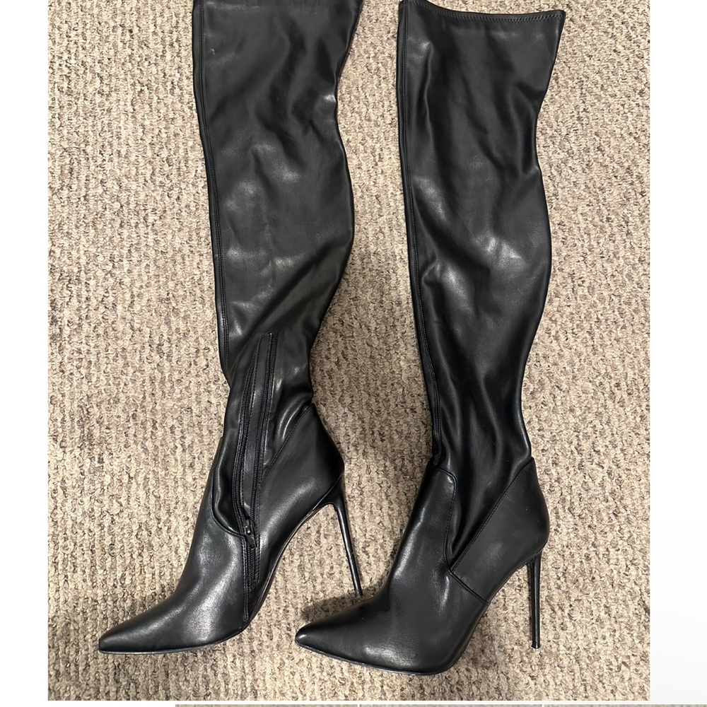 Knee high stiletto boots